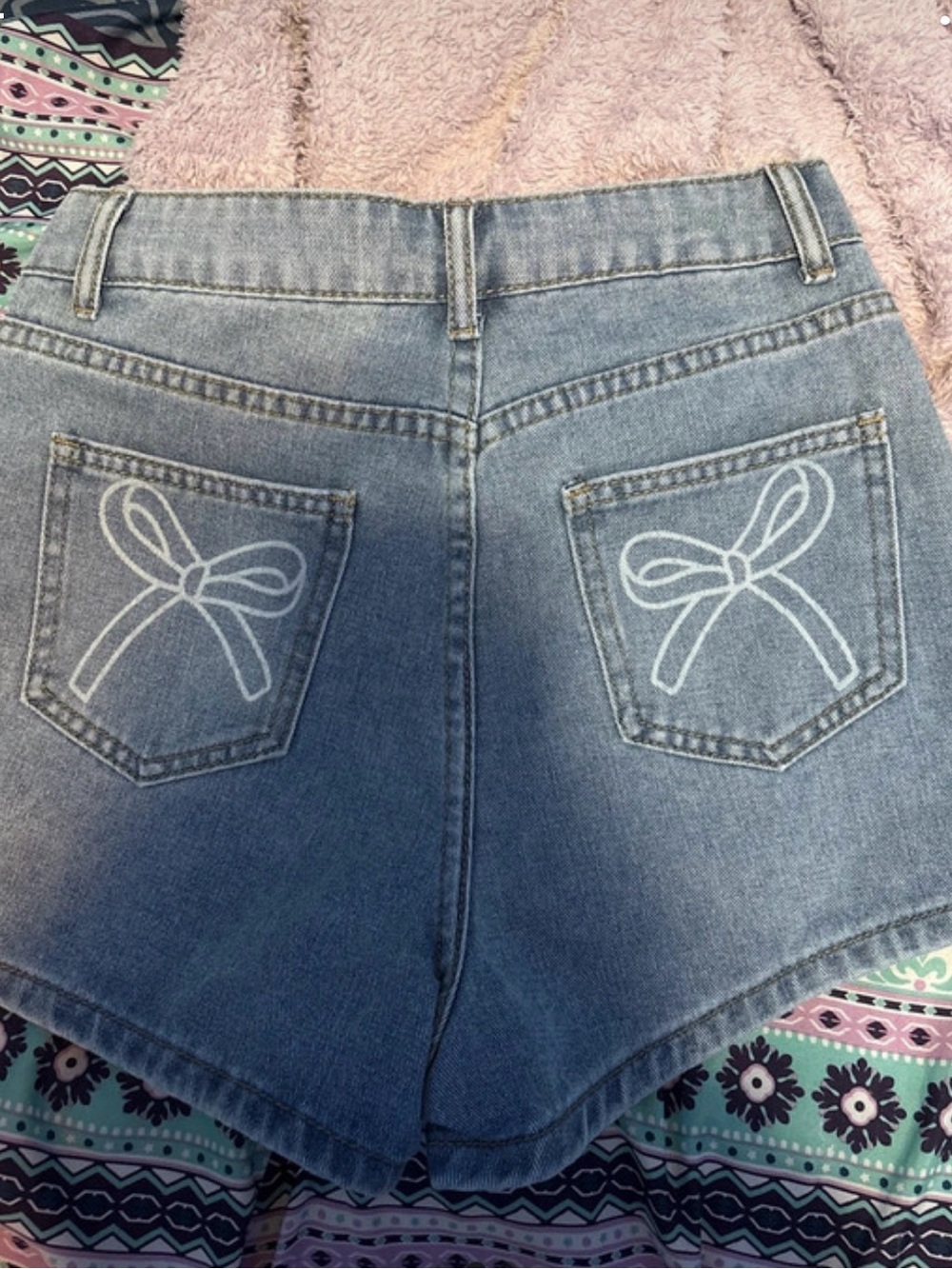 SHEIN Light Blue High-Rise Denim Shorts with Bow Pocket Print